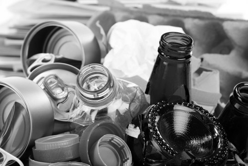 Crew loading mixed commercial waste from a shopfront near the high street