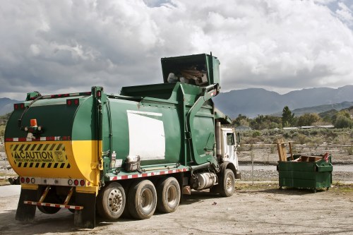 Segregated hazardous waste bins and labeled containers